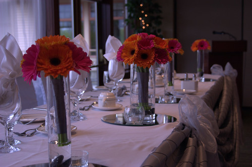 Gerbera Wedding Dayna's bridal bouquet matched the fun table centerpieces
