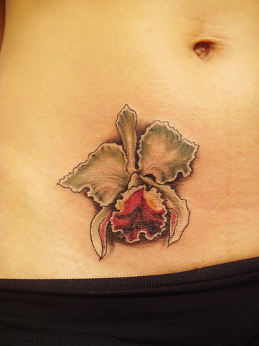 Orchid tattoo cover up by Miguel Angel tattoo