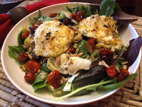 Mixed greens with roasted tomato, marinated artichokes and broiled goat cheese