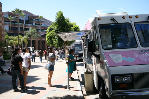 Food trucks parked along Wilshire Blvd. in Miracle Mile