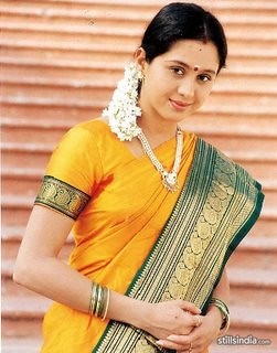 Tamil actress Devayani in yellow saari
