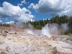This is Steamboat Geyser splashing around in various minor eruptions.  Both photos are from the lower platform.