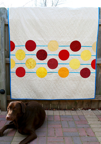 someone wanted his picture taken with the new quilt