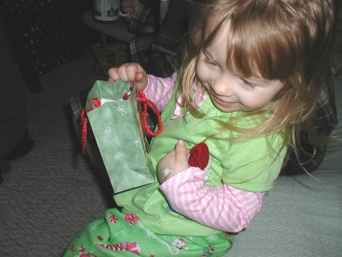 Loving her Santa ornament