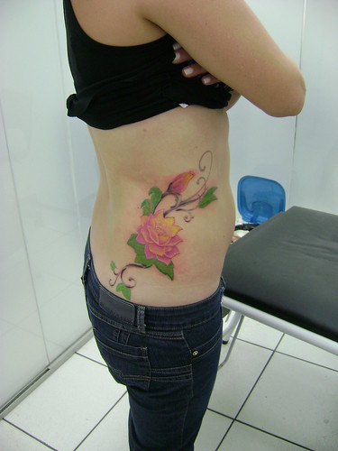 Bird and Roses Tattoo Designs on Women Waist. Email. Written by maki12 on