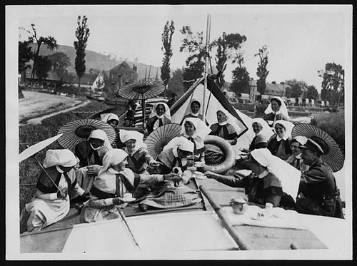 Red Cross Barge Nurses during a quiet spell in France take tea in a barge