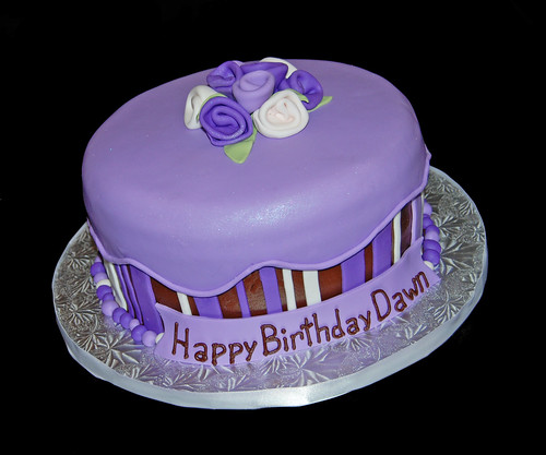 purple and brown birthday day cake