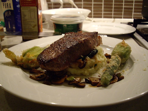 Steak with spinach, mash & zucchini flowers. 