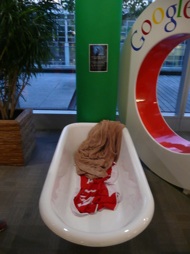 Douglas Adams' bath tub with towels in the Google office London by  you.