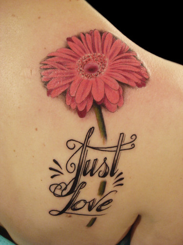 Gerbera Daisy Tattoo by Miguel Angel tattoo. From Miguel Angel.