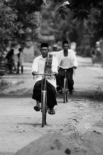 Muslim cycling to Jumaat prayer, Jember, East Java