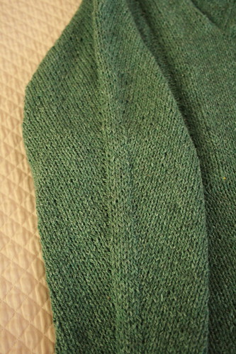 green sweater sleeve