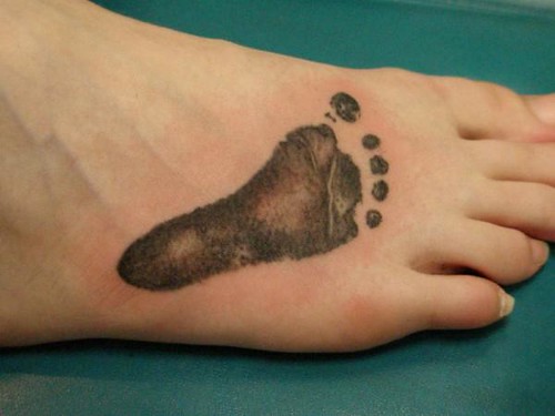 baby footprints tattoo. Baby footprint tattoo