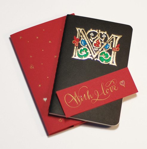 illuminated letter m. Notepad with letter M