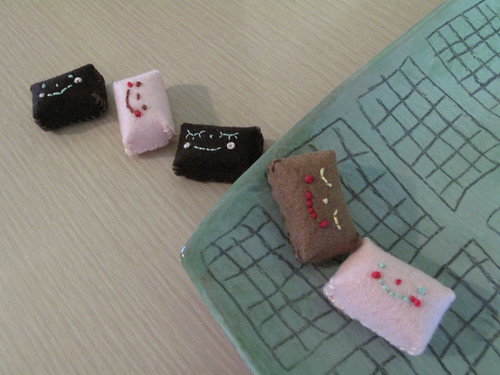 Miniature felt candy that I sewed by hand.