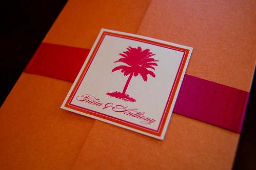 I designed an orange gatefold wedding invitation with a palm tree and closed