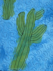 painted and stitched cacti