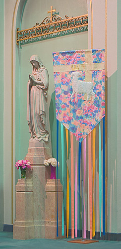 Immaculate Conception Roman Catholic Church, in Maplewood, Missouri, USA - statue of the Blessed Virgin Mary with Resurrection banner