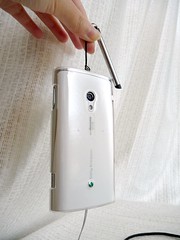 Retractable mini stylus with audio port protector