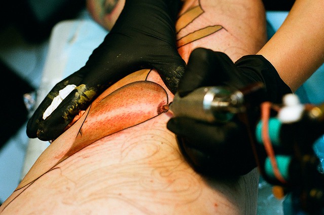 photo of the day 1/6/2010 - Tattooed Boob. A Boob being tattooed onto my leg 
