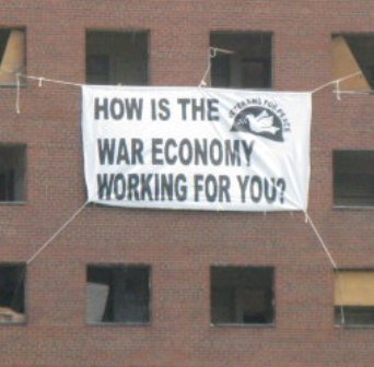 VFP war economy banner drop at USSF Detoit