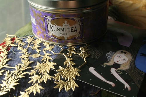 Kusmi tea, golden leaves, + an Earles girl