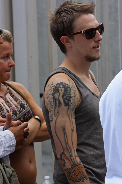 Dude with a tattoo of Gustav Klimt's "Nuda Veritas" ("Naked Truth")