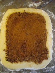 Brown sugar & cinnamon sprinkled on top of melted butter