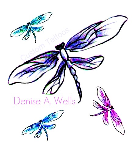 A few nice dragonfly tattoo images I found: