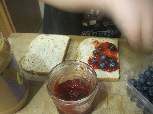 blueberries on strawberry jam