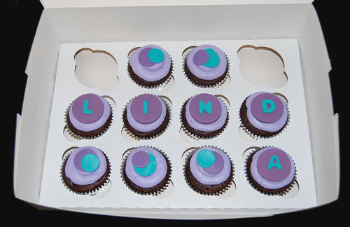 Purple and turquoise birthday cupcakes
