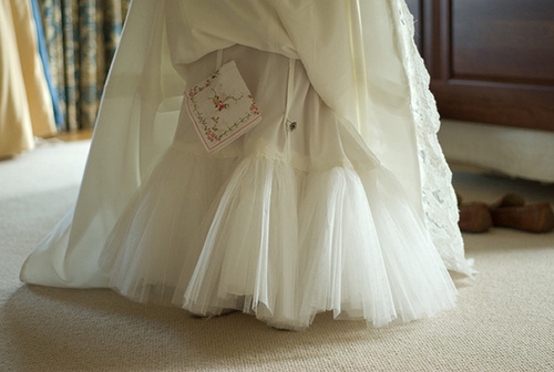 An embroidered handkerchief sewn into your gown on your wedding day with 