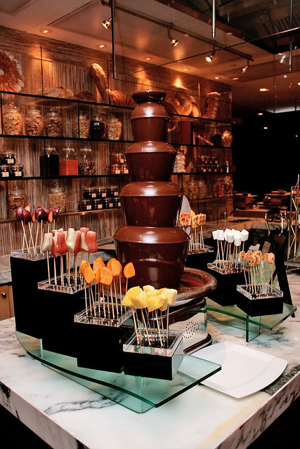Chocolate tower next to the waffle and ice cream station