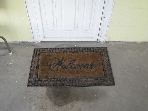 Welcome mat found on street on my way home last Friday