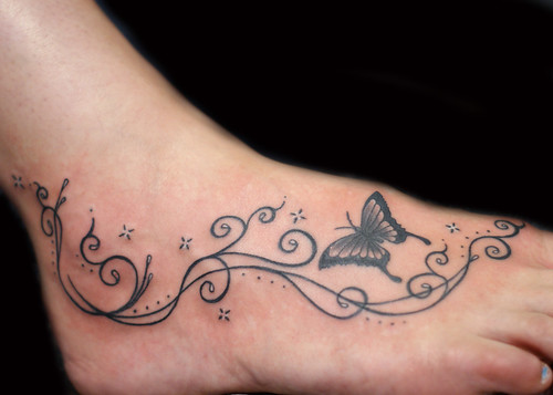 Butterfly and Girly Swirly Pattern Foot Tattoo by PauloTattoos
