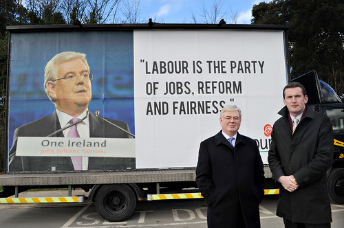 Eamon Gilmore and Aodhain ORiordain with mobile billboard