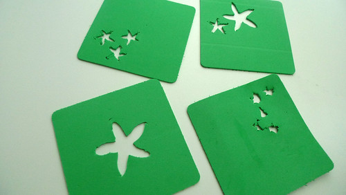 green coasters with flowers