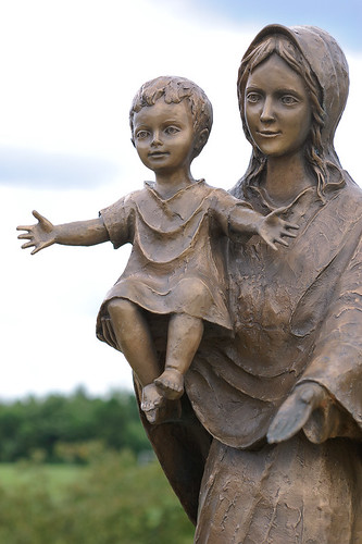 Saint Alban Roe Roman Catholic Church, in Wildwood, Missouri, USA - detail of bronze statue of the Blessed Virgin Mary and Christ Child