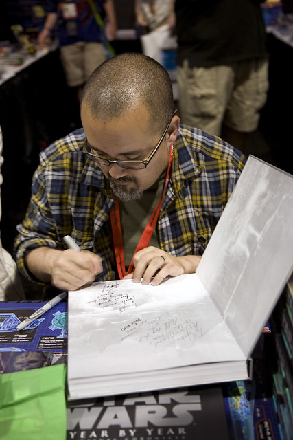 Pablo Hidalgo, contributing author of Star Wars Year by Year: A Visual Chronicle signing books for fans. Photo by Nicole Love.
