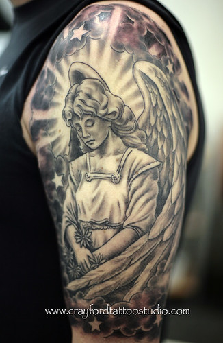 Angel, stars and flowers Tattoo by The Tattoo Studio