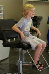 Silas waits his turn at the haircutters
