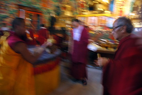 His Holiness Dagchen Rinpoche praying prepares to pour blessed water on the Hevajra mandala to clean it off, Sakya Lamdre, Tharlam Monastery of Tibetan Buddhism, Boudha, Kathmandu, Nepal by Wonderlane