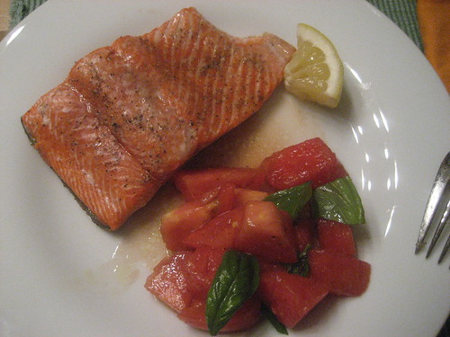 Grilled salmon and grilled watermelon and tomato salad