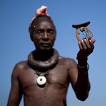 Himba man with his headrest - Angola
