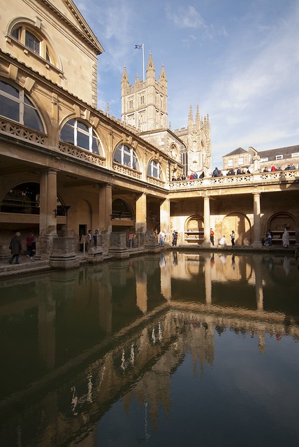 The Roman Baths and Bath Abbey in the warm glow of the afternoon sun.