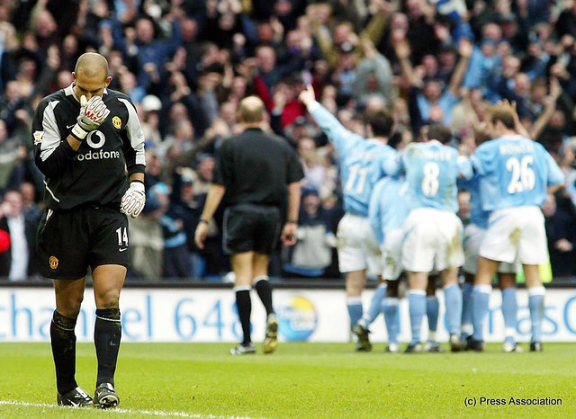 Shaun Wright-Phillips, scorer of Citys fourth against United in March 2004 celebrates with his team mates