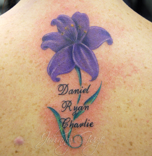 lily and names tattoo Tattooed by Johnny at The Tattoo Studio