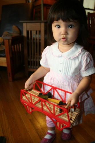 Playing with a train set at the Button's house