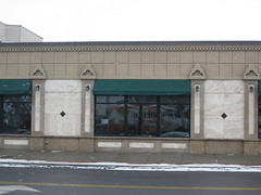 empty storefront in Eastwood, Syracuse (by: Doug Kerr, creative commons license)