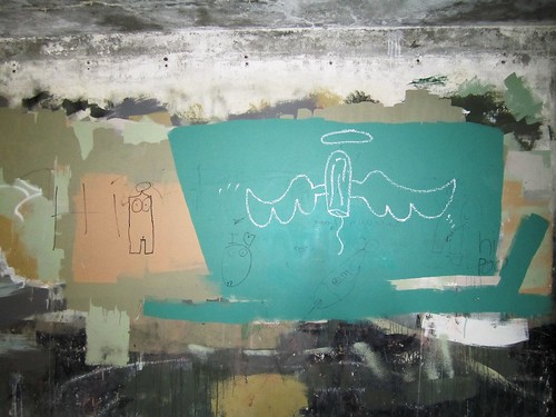 graffiti -- tampon with angel wings and a halo